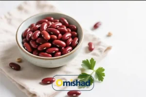 لوبیا قرمز خمین عمده 5 کیلویی 5 کاسه سرامیکی سفید پر از لوبیا قرمز خمین عمده 5 کیلویی امیشاد روی دستمال کرمی با برگ جعفری تازه.